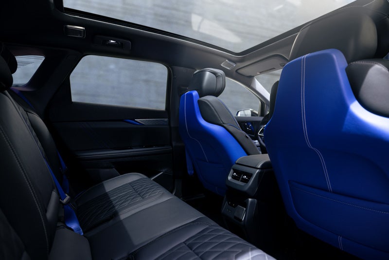 Back Seat View of the 2026 OPTIQ-V Blue Front Seats, Sun Roof, and Interior | Paradise Cadillac in Temecula CA